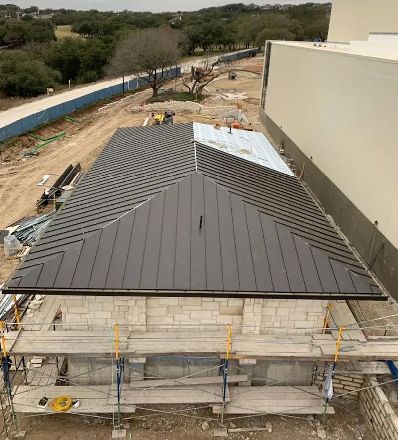 Metal roof new construction with scaffolding in Gladstone
